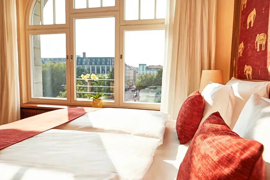 Hotel orania berlin orania.50 size room detailed window and bed view.